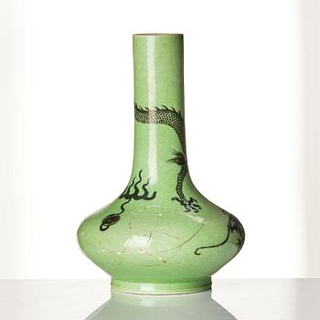 A green glazed vase with a five clawed dragons, Qing dynasty, Kangxi (1662-1722).