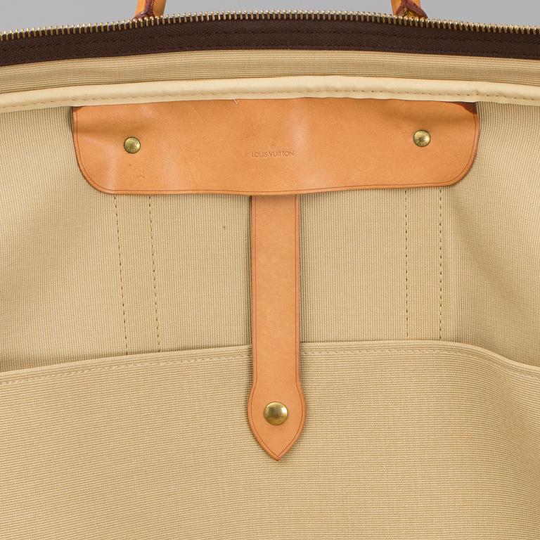 LOUIS VUITTON, a 'Sirius 65' monogram canvas suitcase.