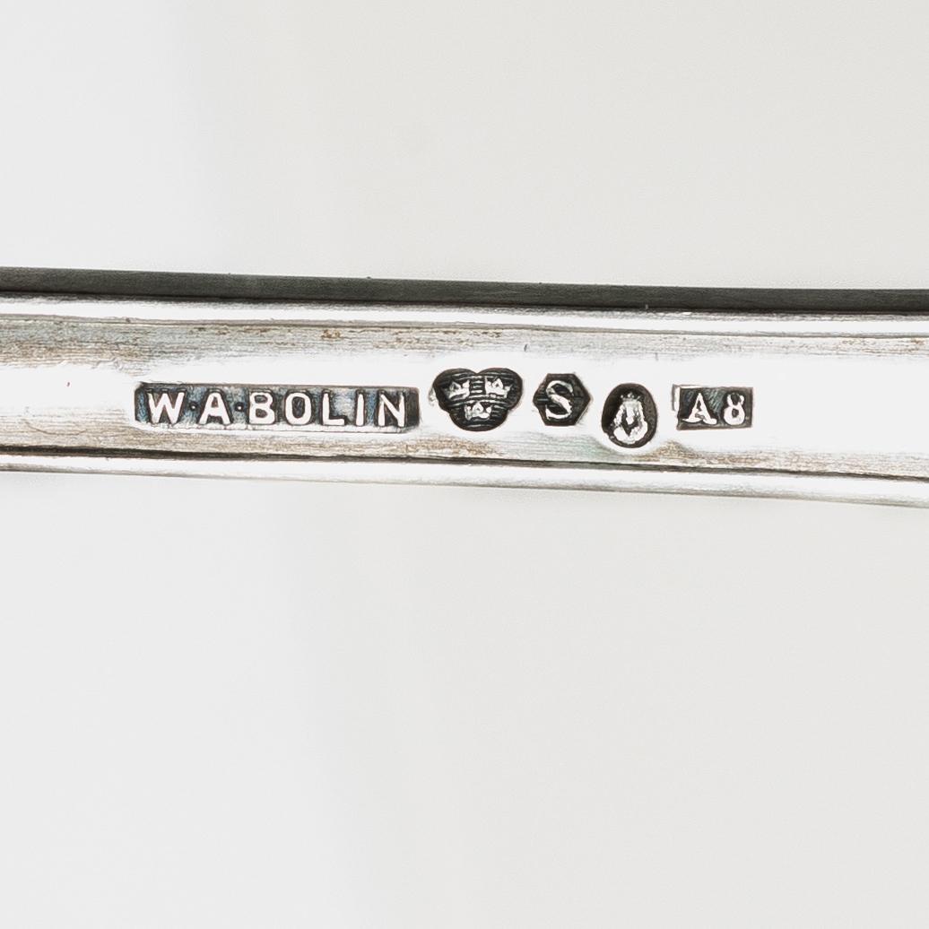 W.A. Bolin, Fiskbestick, 24 delar, silver, modell F, Stockholm 1927.