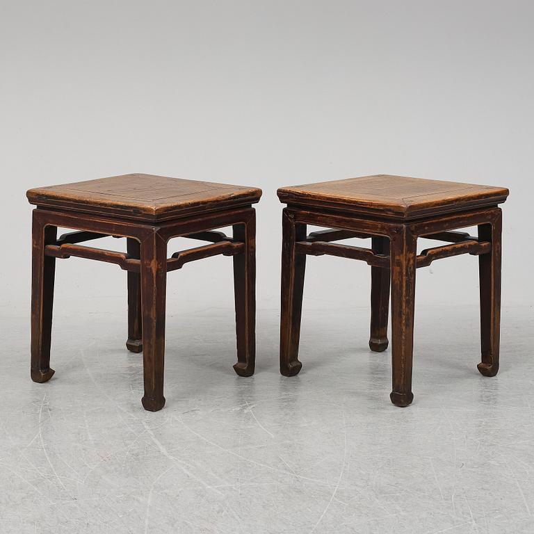 A pair of hardwood tables, 20th century.