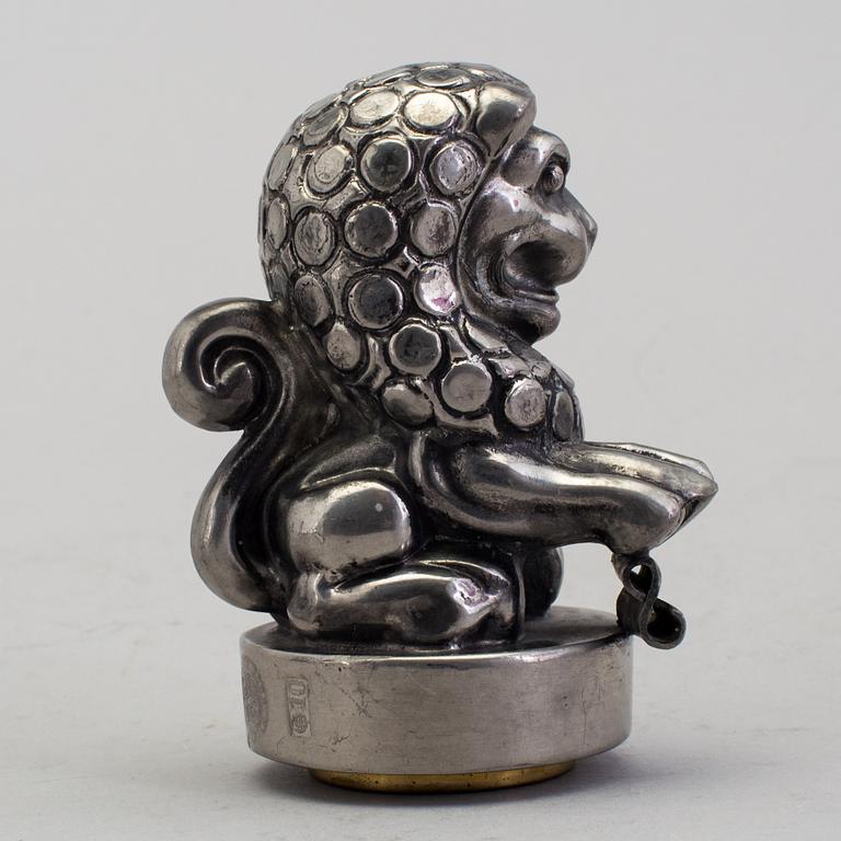 ANNA PETRUS, seal stamp with a brass stamp, pewter and brass, Svenskt Tenn, 1981 (year mark blurred).