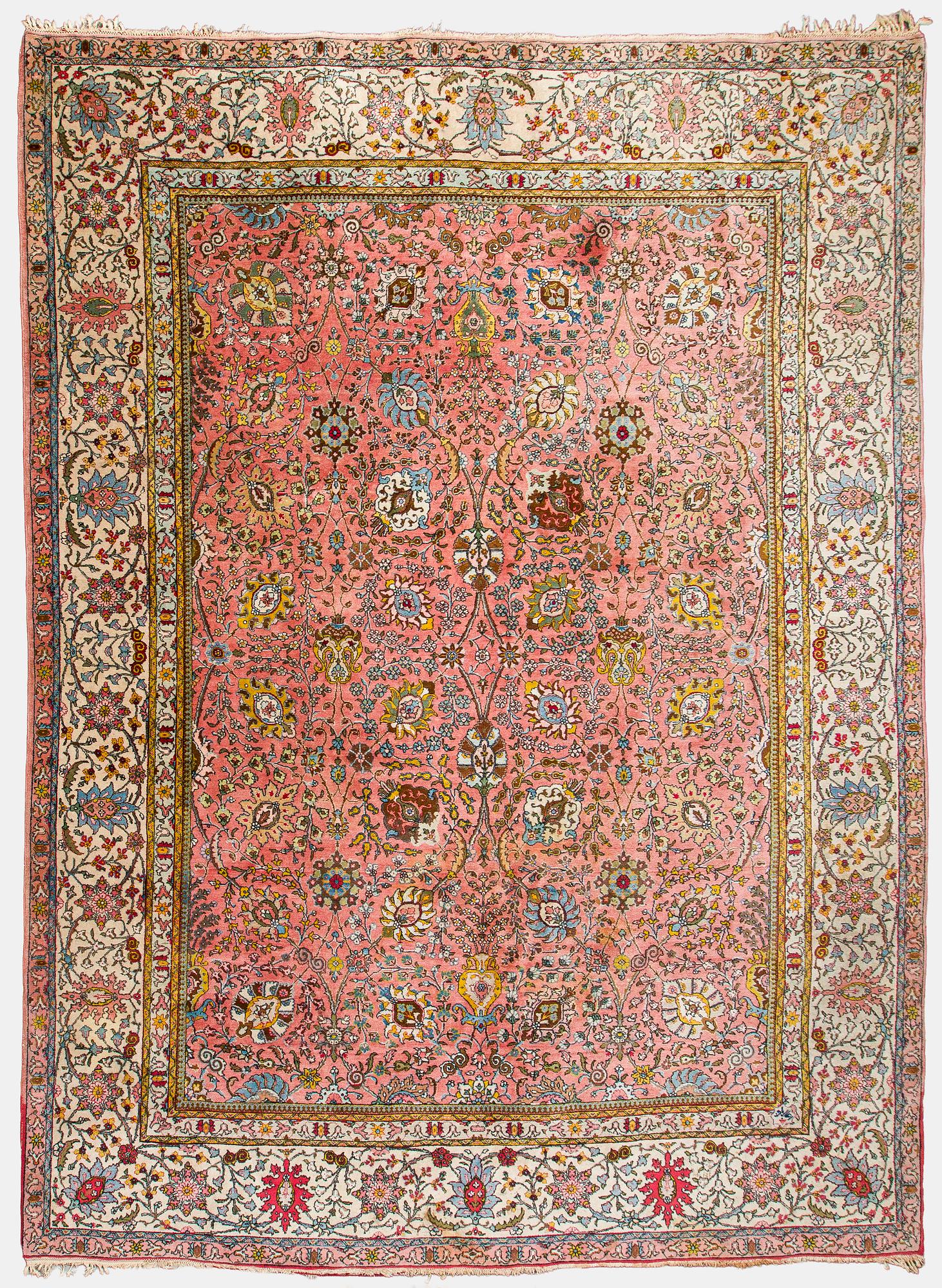 A Tbriz carpet of Safavid 'vase' design, approx. 397x295 cm.
