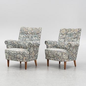 Carl Malmsten, a pair of Hemmakväll easy chairs .
