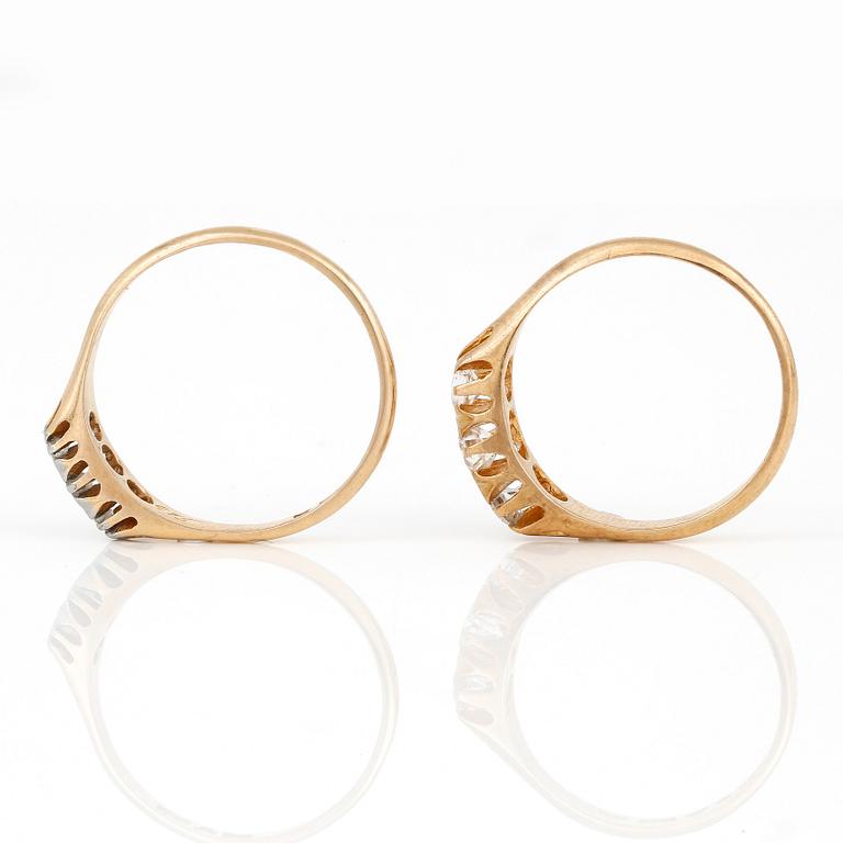 RINGAR, 2 st, med briljantslipade diamanter samt syntetiska vita spineller, G Dahlgren & Co, Malmö, 18K guld.