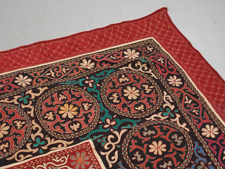 A Suzani textile, ca 247 x 128 cm.