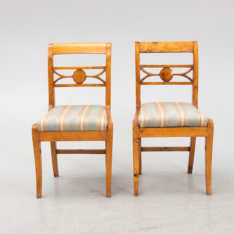 Drop-leaf table and two chairs, Empire style, first half of the 19th century.