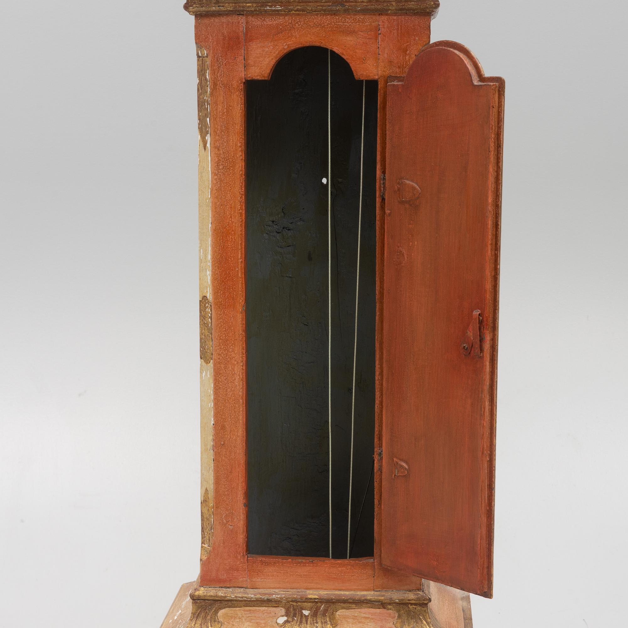 A 18th century longcase clock.