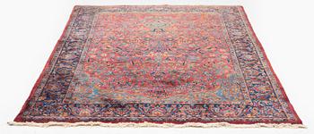 An antique Manchester Kashan rug, c. 197 x 126 cm.