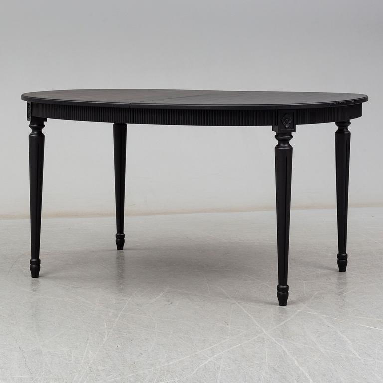 A second half of the 20th century Gustavian style dining table.