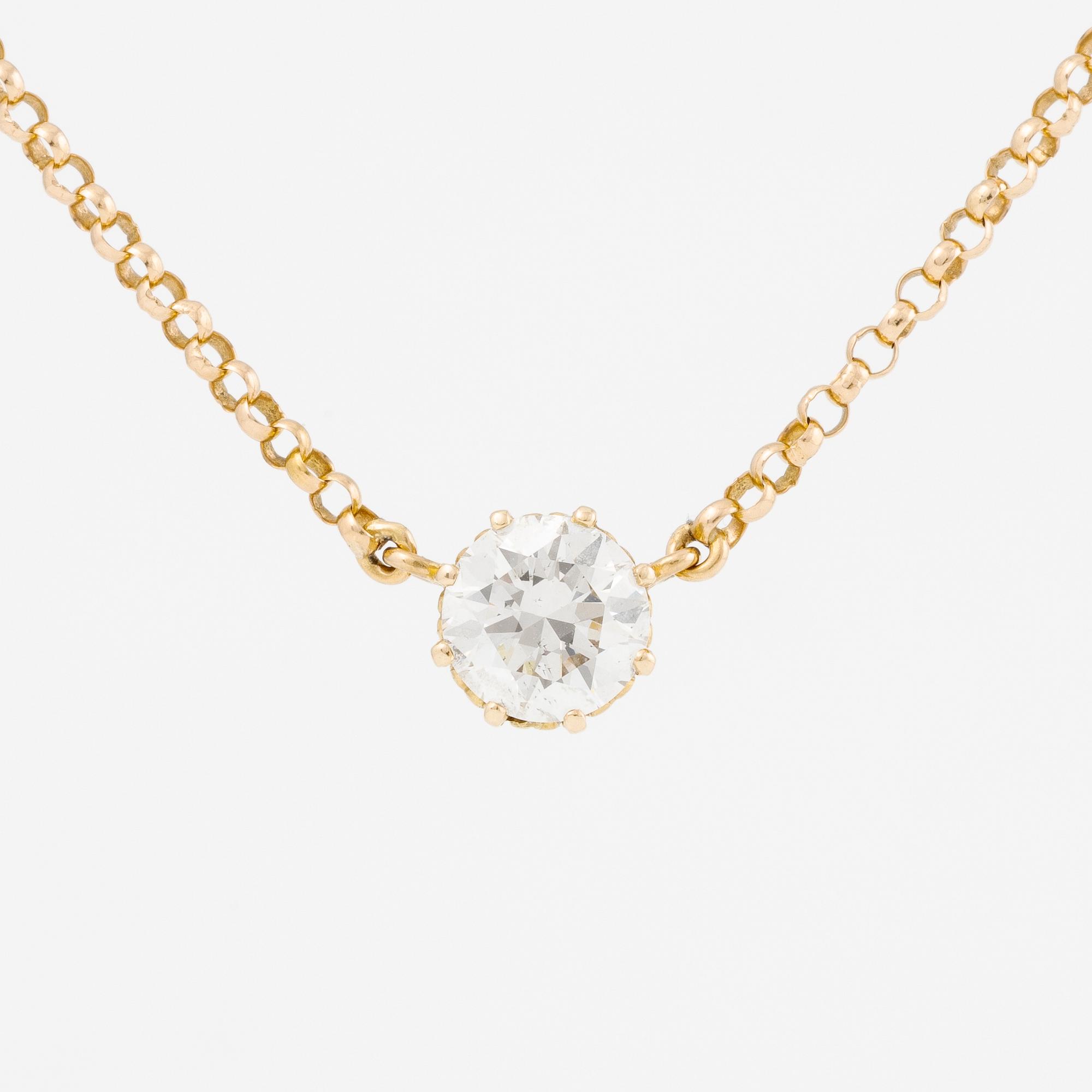 Hängsmycke 18K guld med en rund briljantslipad diamant.