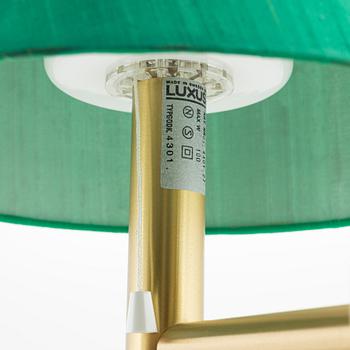 A pair of brass wall lights, Luxus.