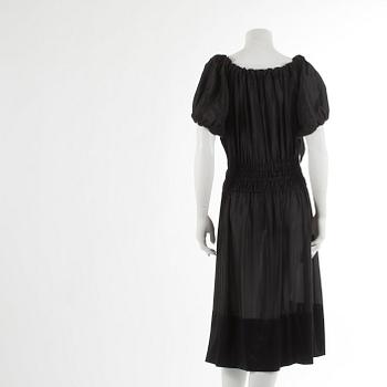 DKNY, a black silk dress. Size M.