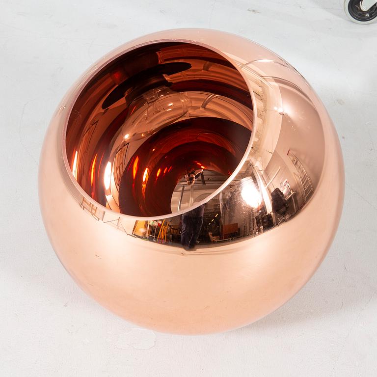 A 'Copper Shade' ceiling light by Tom Dixon from the 21st Century.