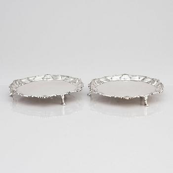 A pair of English silver salvers/plates, marks of Thomas Cooke II and Richard Gurney, London 1753.
