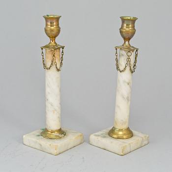 Two similar late gustavian  candlesticks, ca 1800.