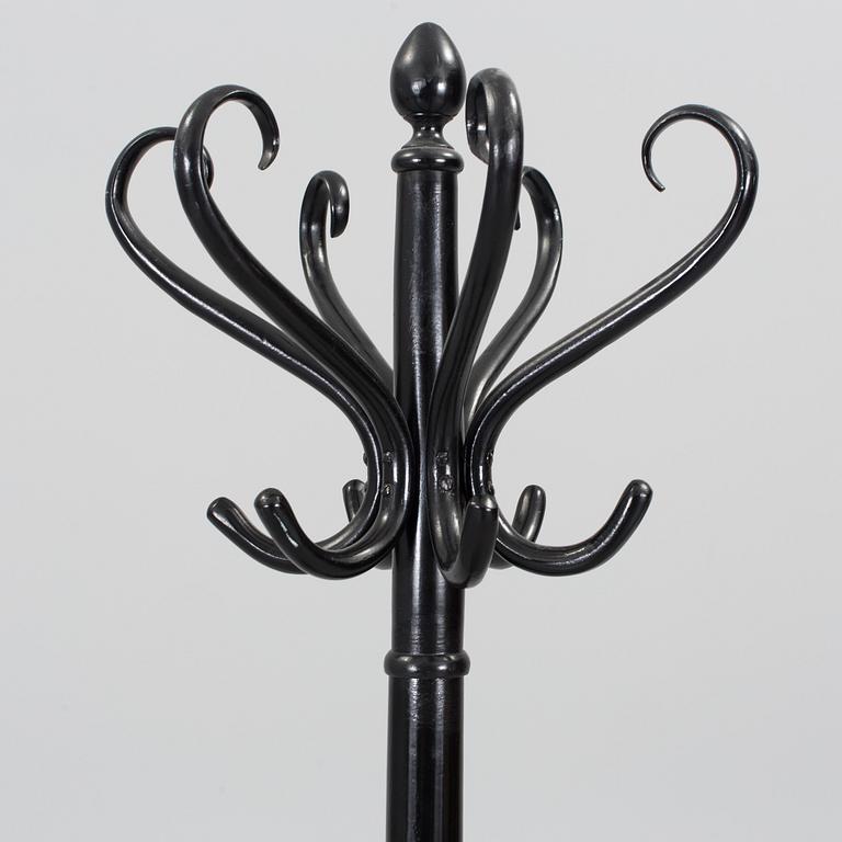 A 20th century wooden hat and coat stand.