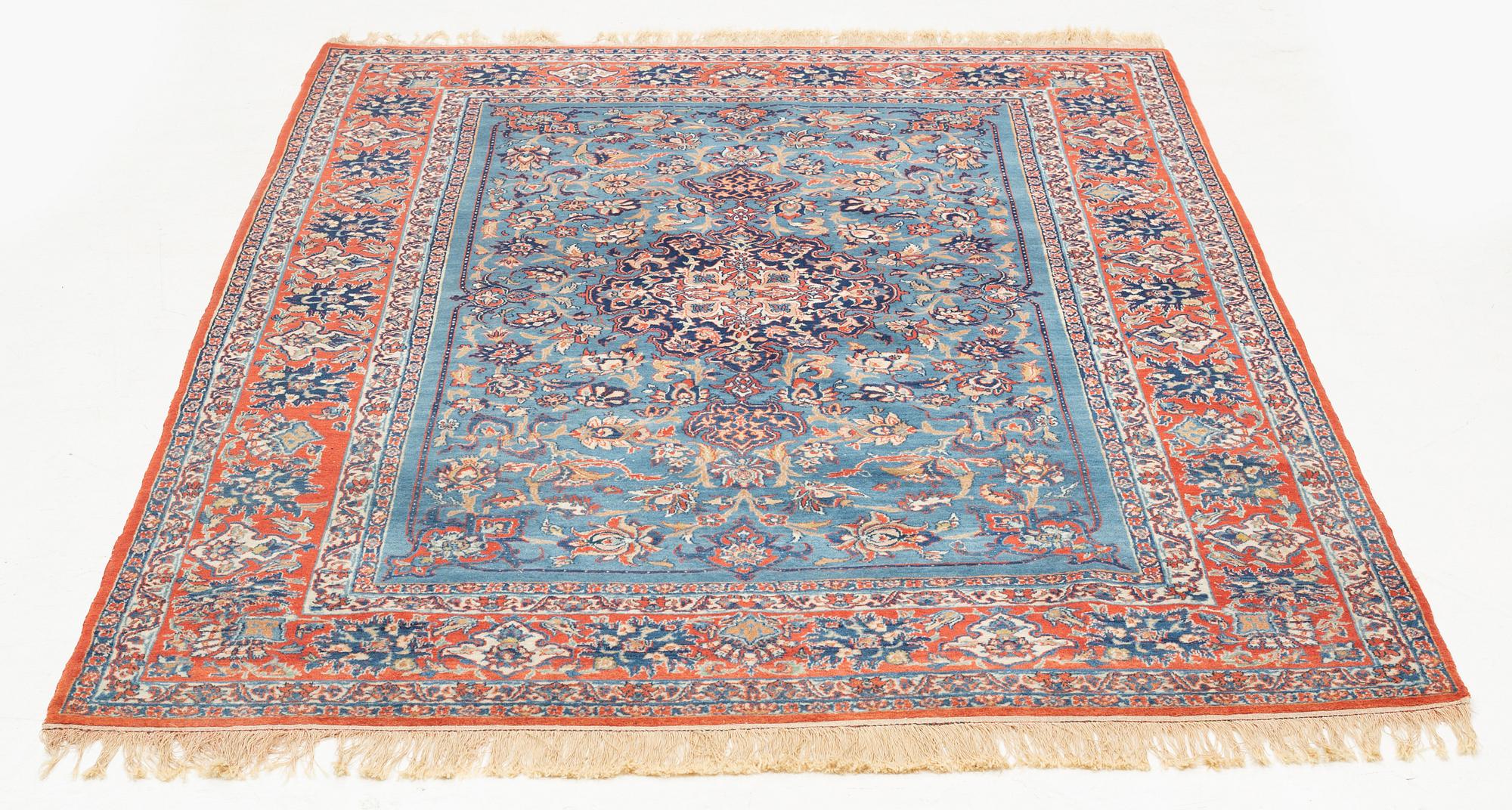 An antique Isfahan, ca 220 x 145 cm.