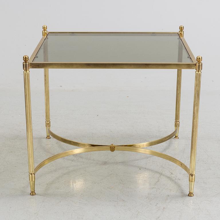 A brass and glass coffee table from the second half of the 20th century.