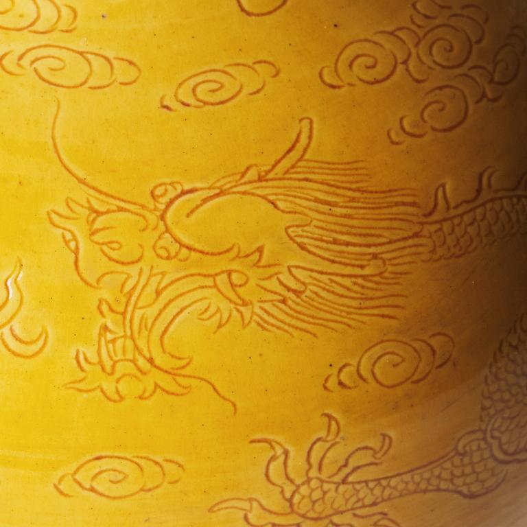 A yellow glazed 'five clawed dragon' vase, Qing dynasty with Kangxi six character mark.