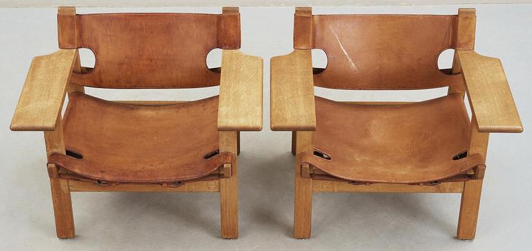 A pair of Børge Mogensen oak and leather 'Spanish Chair' by Fredericia Stolefabrik, Denmark.