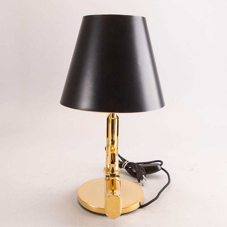 Philippe Starck, bordslampa, "Gun bedside Lamp", Flos, formgiven 2005.