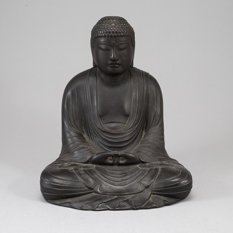 A Japanese buddha sculpture, late 20th Century.