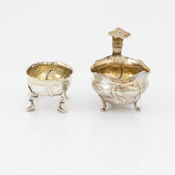 A Swedish Parcel-Gilt Silver Rococo Creamer and Salt Cellar, 18th century.