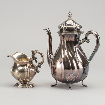 A DANISH COFFEE POT AND A SWEDISH CREAMER, silver.