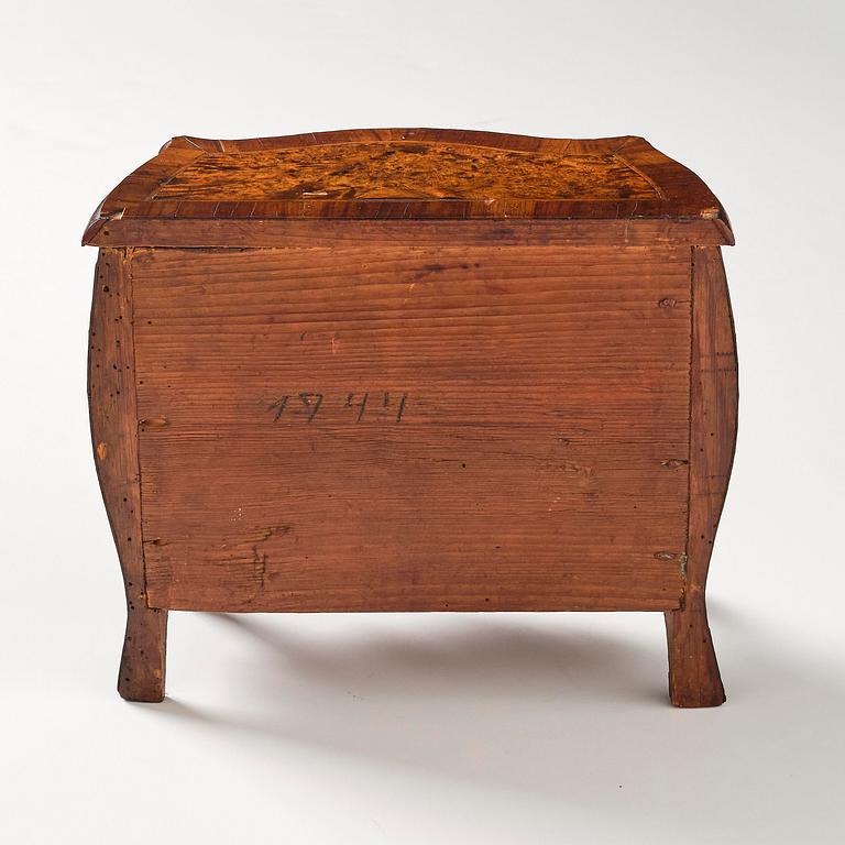 A Swedish rococo walnut parquetry miniature commode, later part 18th century.