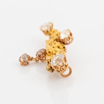Brosch guld med gammalslipade diamanter och en rådiamant.