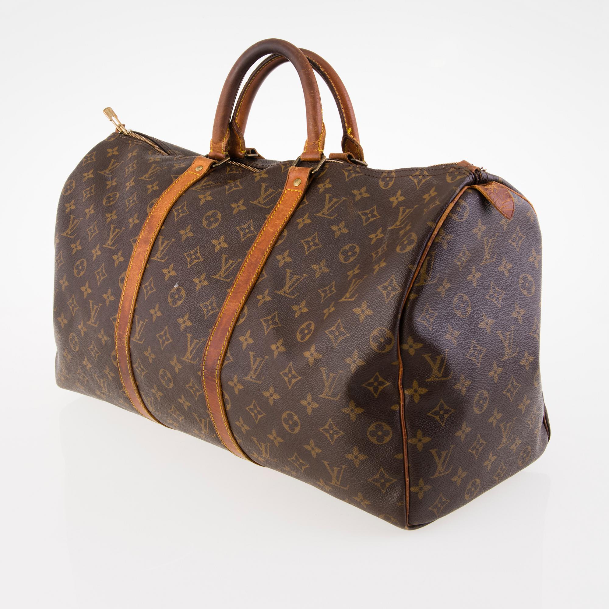 Old louis vuitton duffle bag discount