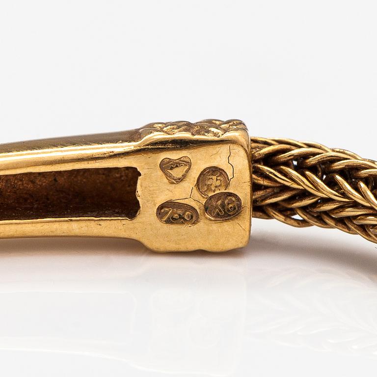 An 18K gold bracelet "Moose head". Kalevala Koru, Helsinki 1999.