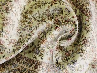 An Oriental silk rug, approx. 124 x 183 cm.