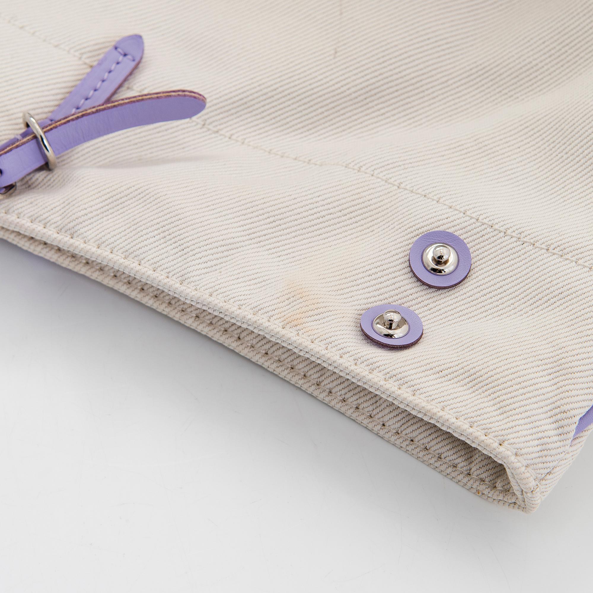 Louis Vuitton, a 'Cotton Canvas Articles De Voyage Cabas GM' bag.