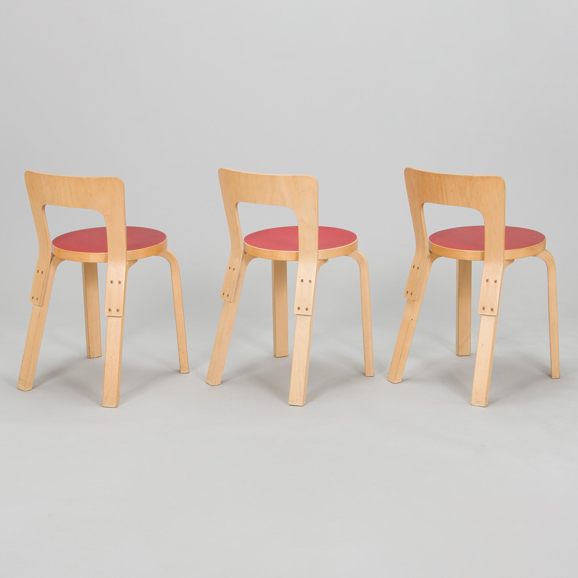 Alvar Aalto, A mid-20th century drop leaf table and three chairs for O.Y. Huonekalu-ja Rakennustyötehdas A.B.