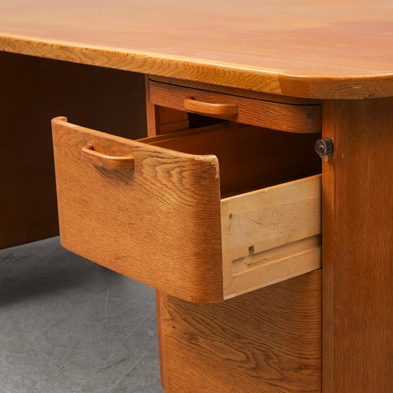 A 1950/60's oak writing desk.