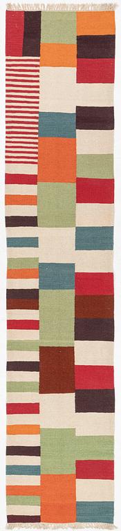 A Kilim runner, c. 388 x 80 cm.