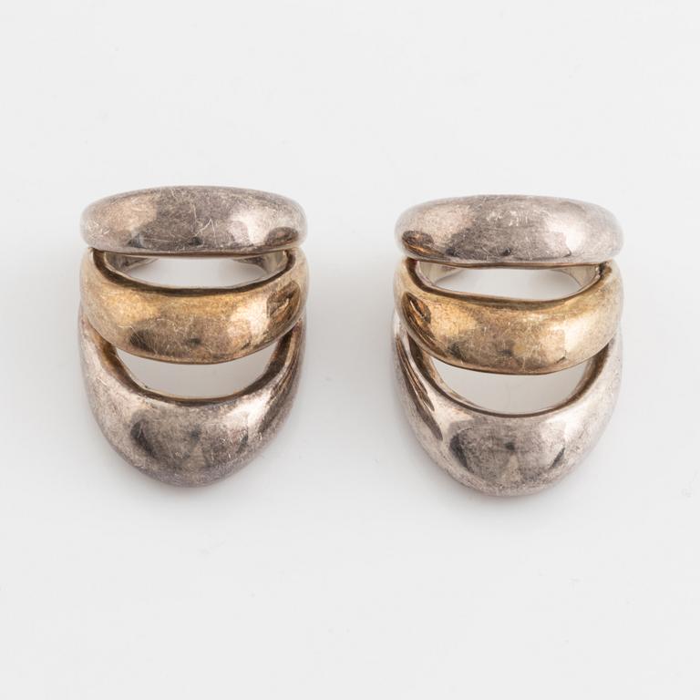 Two silver rings.