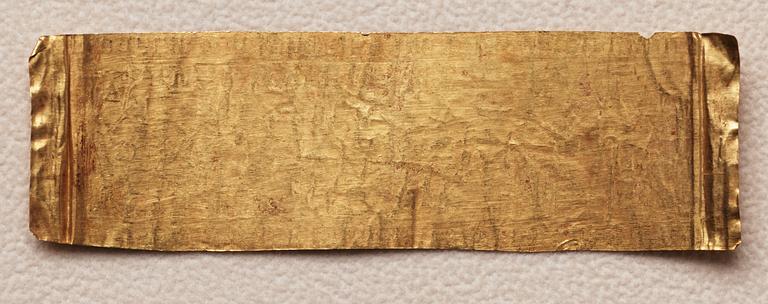A set of nine presumably modern Egyptian-style gold foil sheets with figures and hieroglyphs.