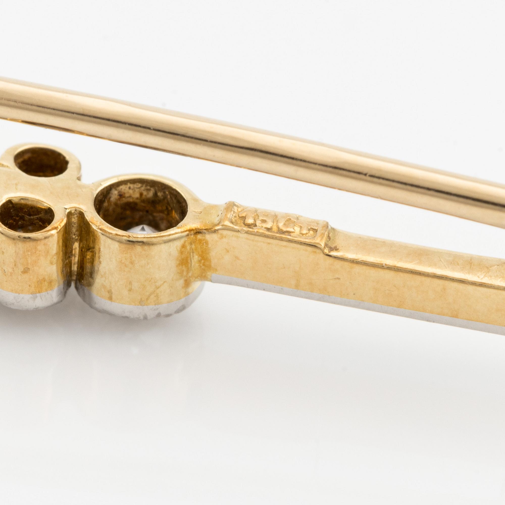 Brosch 18K guld med gammalslipade diamanter.