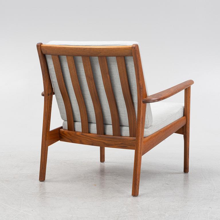 A 1950s/60s teak easy chair.