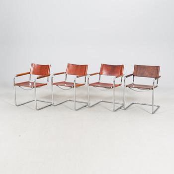 A matched set of four Matteo Grassi chrome and leather armchairs, late 20th Century.