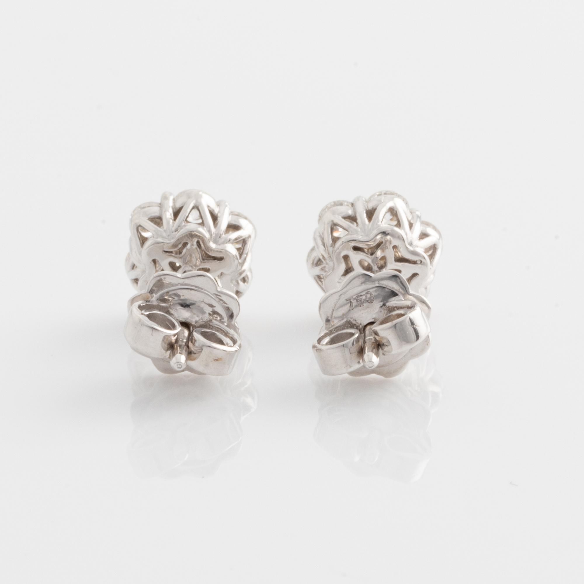 Earrings with brilliant-cut diamonds.