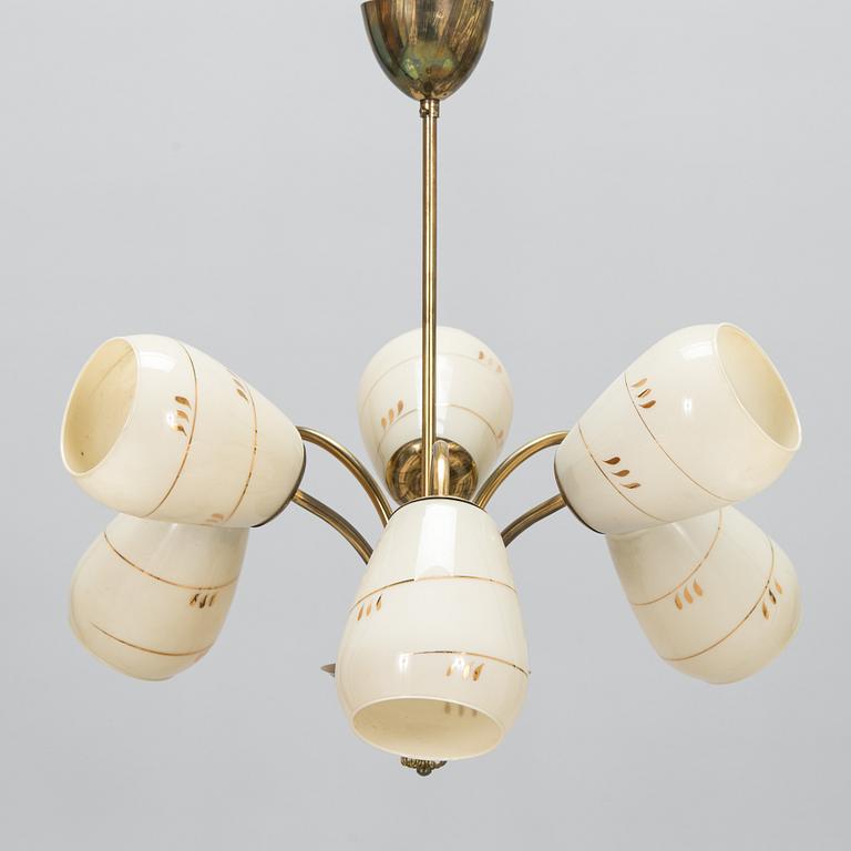 A mid-20th-century brass ceiling light, Finland.