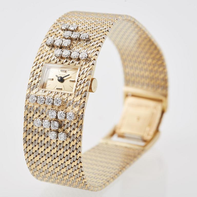 DAMARMBANDSUR, 18K guld med briljantslipade diamanter, ca 0.70 ct. Numa.