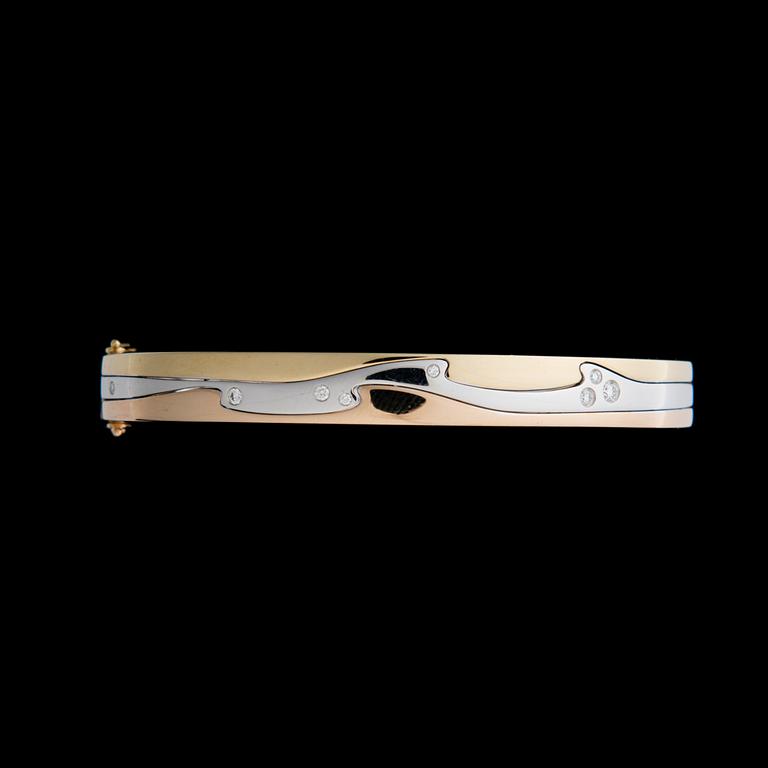 GEORG JENSEN, ARMRING, "Fusion", 18K guld i tre färger, briljantslipade diamanter.