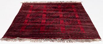 An old Afghan rug, c. 250 x 200 cm.