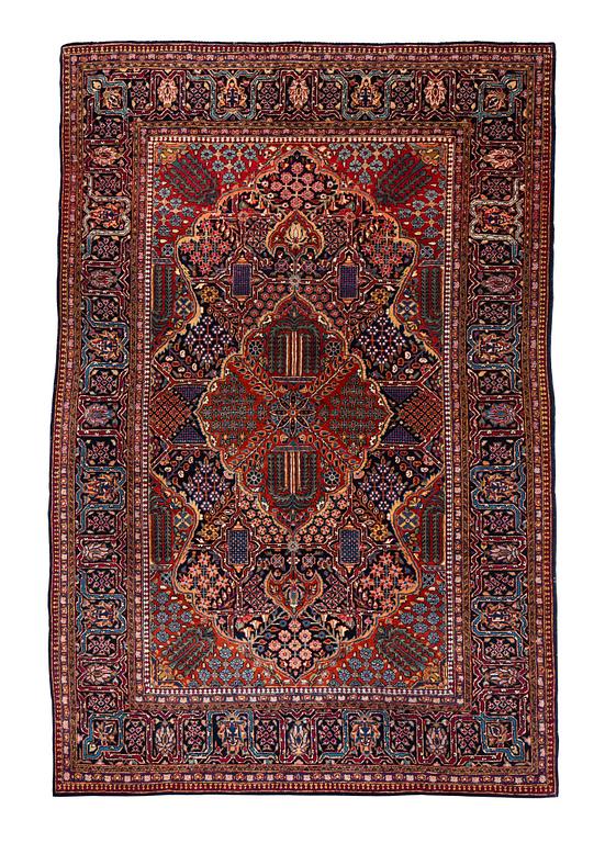 A rug, semi-antique Kashan, ca 216,5 x 140 cm.