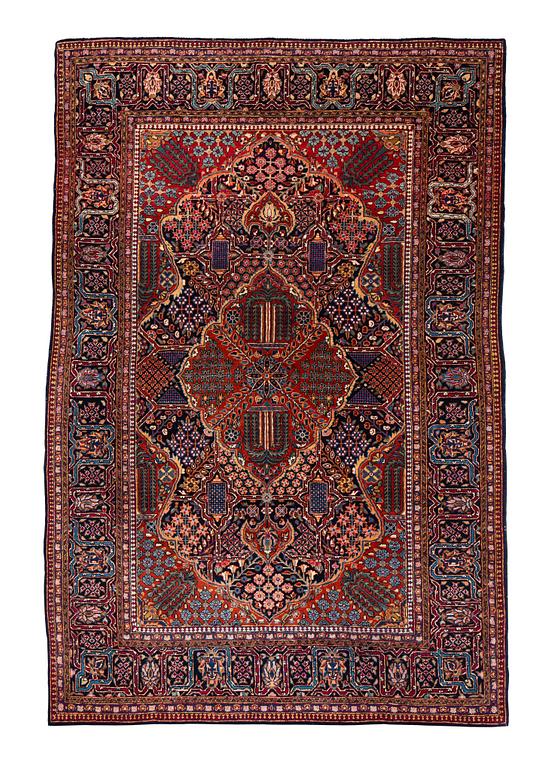 A rug, semi-antique Kashan, ca 216,5 x 140 cm.