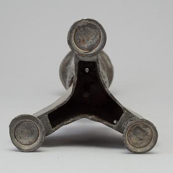 A 17th century pewter candlestick.